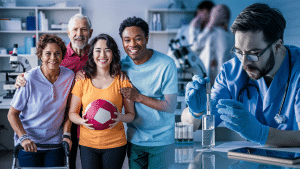 Diverse group of two or three people (adults or young adults) smiling and looking healthy. One person using a walker or cane, another could be holding a sports ball or wearing athletic clothing. Background: A medical lab setting with microscopes and scientific equipment in the background. On one side, show a medical professional in scrubs carefully looking at a vial containing a clear liquid.